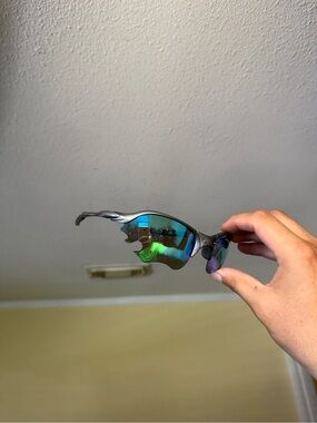 Oakley Women’s Sunglasses - Matte Gray Frame with Blue-Green Iridium Lenses